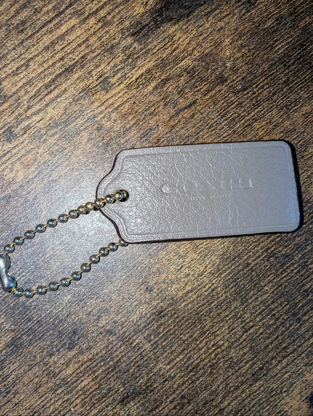 Coach leather tag